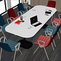 White Oval Conference Table With Laptop Documents Cup And Colorful Chairs In Modern Meeting Room
