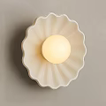 Elegant White Scalloped Wall Lamp With Modern Round Illuminated Center