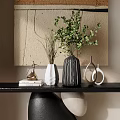 Decorative Ornament Set With Black Shelf Green Plant Vases Mugs And Sculptural Artwork