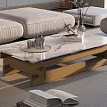 Marble and Black Glass Coffee Table with Wooden Frame and Books Glasses in Living Room