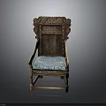 Vintage Wooden Chair With Ornate Carvings And Blue Fabric Cushioned Seat