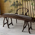 Traditional Chinese Musical Instrument Guqin on Wooden Table with Bamboo Screen and Plants