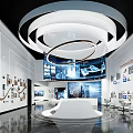 Modern Exhibition Hall With Circular Chandelier Large Screen Displays And White Platform