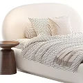 Pastel Pink And Beige Double Bed With Curved Headboard Striped Bedspread And Decorative Pillows