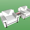 Stylish White Single Sofa With Brown Trim And Patterned Cushions By Small Coffee Table 3d model