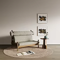 Gray Fabric Single Sofa with Wooden Frame on Carpet Near Side Table and Wall Art