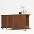 Minimalist Wooden Sideboard With Metal Frame And Decorative Vase With Branches On Top