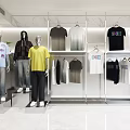 Fashion Mannequins Displaying Stylish T shirts Hoodies And Jeans On Modern Clothing Store Racks