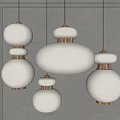 Modern Minimalist Pendant Lights With White Textured Shades And Brass Bases