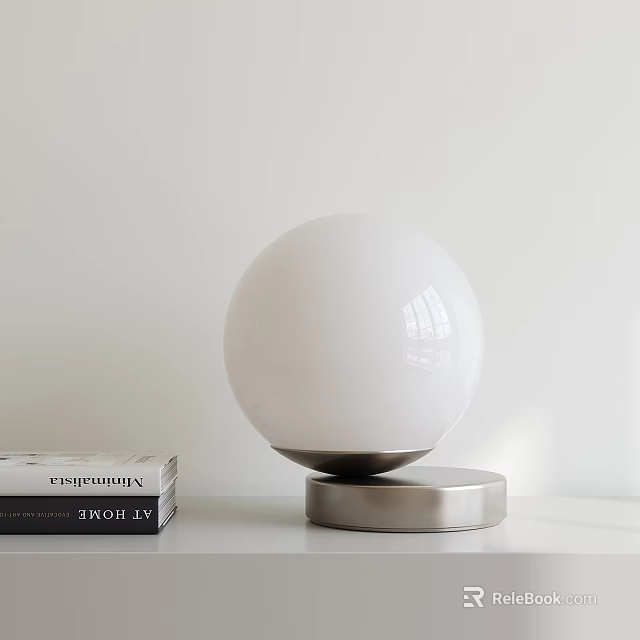 Modern White Globe Table Lamp With Silver Base On White Tabletop And Books 3d model 