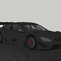 Black Racing Car With Rear Wing Red Wheels And Sleek Body Design On Open Road