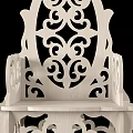 Elegant White Wooden Leisure Chair With Intricate Carved Patterns On Backrest And Armrests