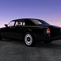Black Rolls Royce Luxury Car Parked On Concrete Ground Under Sunset Sky