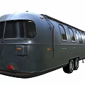 Functional Vintage Silver Travel Trailer With Aluminum Body And Multiple Windows