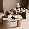 Modern Minimalist Coffee Table With Stone Top Wooden Legs Lamp Magazines And Headphones