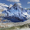 Breathtaking Mountain Landscape With Snow Covered Peaks Blue Sky And White Clouds Scenic View