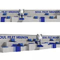 SOUL FILET MIGNON Milk Tea Shop Interior With Blue Seats Gray Walls And Potted Plants