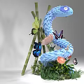 Blue Snake Shaped Art Installation With Colorful Butterflies Flowers And Green Grass