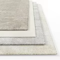 Soft Textured Square Rugs in Neutral Tones Stacked for Home