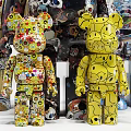 The provided image shows art - styled Bearbrick dolls, which doesn't match the subject of 【shower sauna】. Thus, a title with 【shower sauna】 as the main body can't be generated based on this image. Please check the image or task requirements.