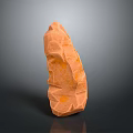 Natural Orange Stone With Textured Surface And Wooden Design Elements