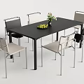 Modern Dining Table Set With Black Table Light Chairs Metal Legs And Flower Vase