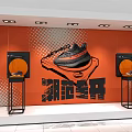 Modern Shop Window Display With Orange Polka Dot Background Sneakers Black Frames And Display Stands