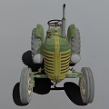Vintage Green And Yellow Tractor With Large Wheels Steering Wheel And Exhaust Pipe