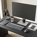 DELL Computer Monitor With Keyboard Mouse Headphones On Modern Desk Setup