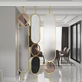 Elegant Gold Frame Room Divider With Various Shaped Marble Glass Panels In Modern Living Room
