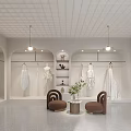Bridal Shop Elegant Interior With Wedding Dresses Mannequins Comfy Sofas And Flower Vase
