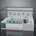 Modern Display Cabinet Furniture With White Counter Black Frame Transparent Compartments And Hanging Silver Balls