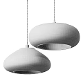 Two Beige Knitted Dome Pendant Lights With Warm Glow For Modern Interior Spaces