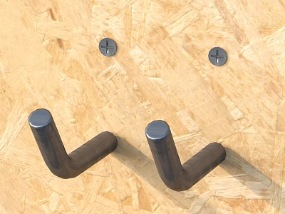 Two Black Hooks Mounted On Light Wooden Textured Background With Small Round Metal Parts 3d model