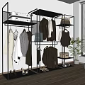 Black Metal Clothing Rack With Hanging Garments Bags Shoes And Suitcase In Modern Room