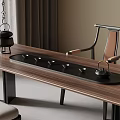Wooden Tea Table Setup With Black Tea Set And Comfortable Chair