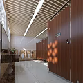 Modern Spacious Public Toilet With Wooden Stalls And Bright Ceiling Lights And Glossy Clean Floor