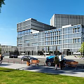 Modern Multi Storey Office Building With Glass Curtain Wall Urban Greenery And Pedestrians