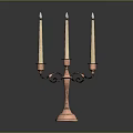 Brass Candelabra With Three Lit Candles And Ornate Design On Dark Background