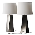 Two Modern Geometric Table Lamps With White Fabric Shades And Metal Bases