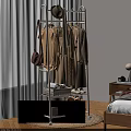 Stylish Clothing Rack with Hanging Clothes Bags and Storage Baskets in Bedroom