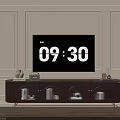 Wooden TV Stand With Glass Front Cabinets Metal Legs And Decorative Items On Paneled Wall