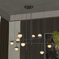 Modern Black Metal Chandelier With Multiple Spherical Bulbs In Wooden Wall Interior