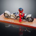 White Motorcycle Model Display With Black Helmet Red Clothed Figure On Brown Wooden Base