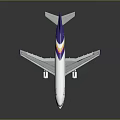 Space Vehicle Model Featuring White Body Purple Tail And Colorful Stripes