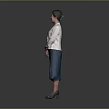 Woman in White Blazer and Blue Skirt Standing with Hands Crossed on Gray Background