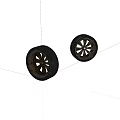 Stylish Automotive Tires With Black Alloy Wheels And Modern Spoke Design