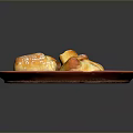Delicious Golden Pastries on Orange Plate Topped with Powdered Sugar and Dark Background