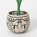 Green Leafy Monstera Potted Plant in Decorative Patterned Ceramic Pot for Modern Home