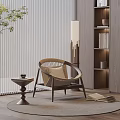 Cozy Wooden Frame Woven Leisure Chair With Round Side Table Floor Lamp Bookshelf And Books